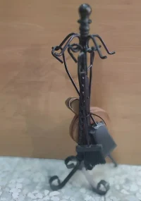 Soporte antiguo para herramientas de chimenea